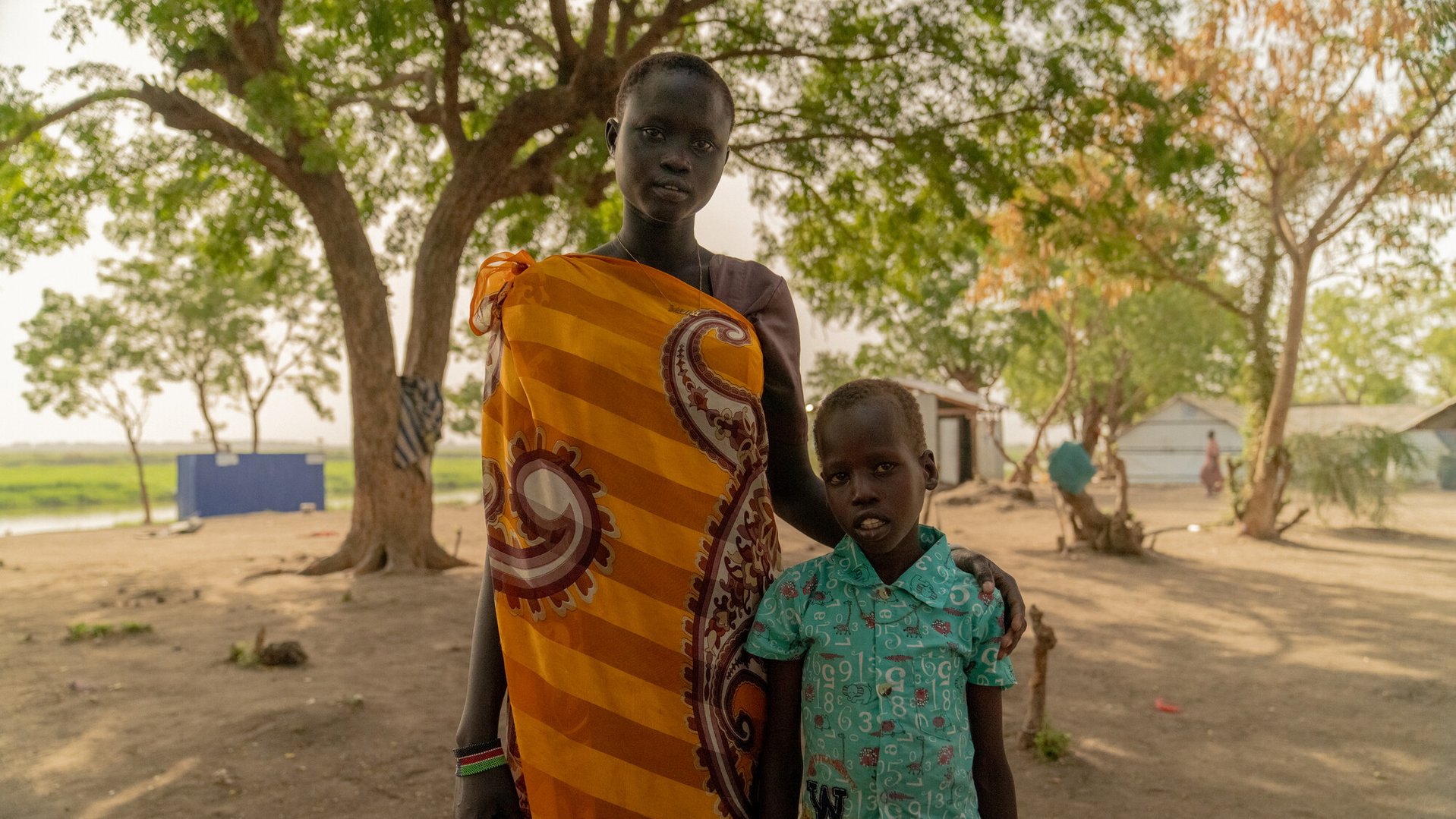 Silbings Nyamach (19) and Deng Ruot Phar (12) are South Sudanese returnees.