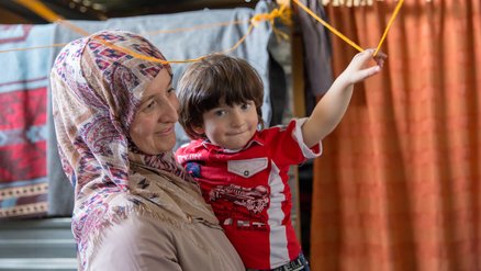 Caregiver - mother- with her child in a refugee camp in Jordan _ War Child_180424.jpg